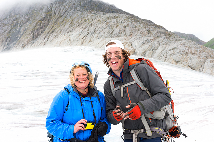 mud mask from glacier, Man jumps over crevasse while trekking adventure on Lemon Glacier, Juneau Icefield, Juneau, Alaska, USA