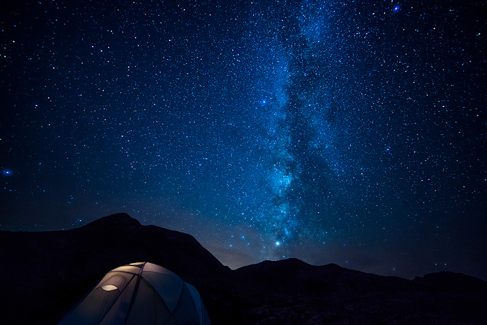 Milky Way over tent in San Juan Mountains