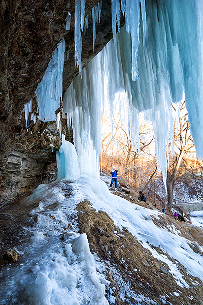 Exploring behind Minnehaha frozen waterfall in Minneapolis, Minnesota, USA