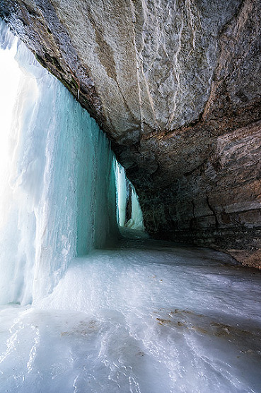 Exploring behind Minnehaha frozen waterfall in Minneapolis, Minnesota, USA