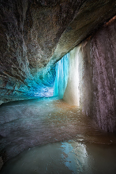 Exploring behind Minnehaha frozen waterfall in Minneapolis, Minnesota, USA