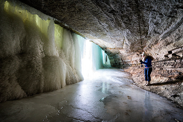 Exploring behind Minnehaha frozen waterfall in Minneapolis, Minnesota, USA