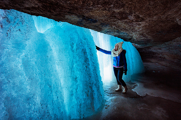 Exploring behind Minnehaha frozen waterfall in Minneapolis, Minnesota, USA