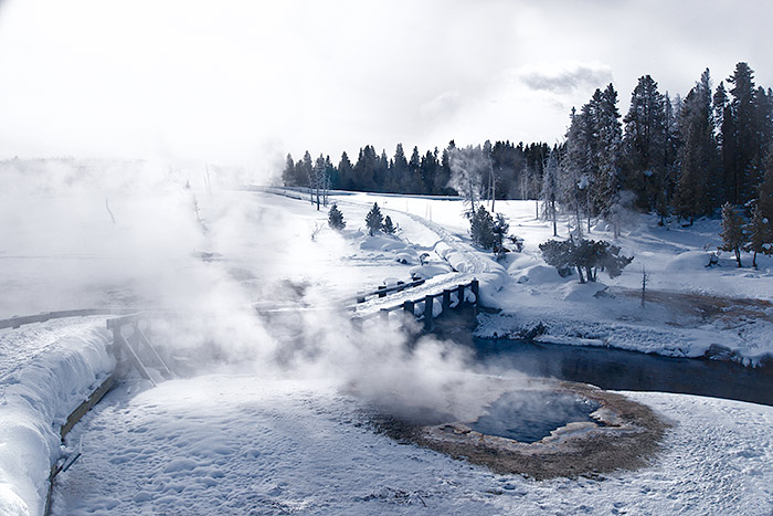 old-faithful-yellowstone-winter