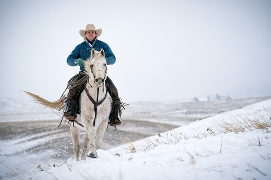 ranch-cowboy-riding-montana-uniquetravelphoto