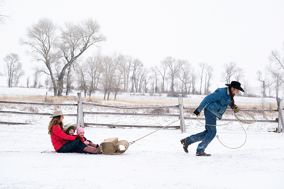 life-on-a-ranch-cowboy-culture-sledding-family-fun