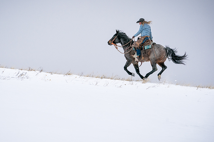 life-on-a-ranch-cowgirl-riding-snow