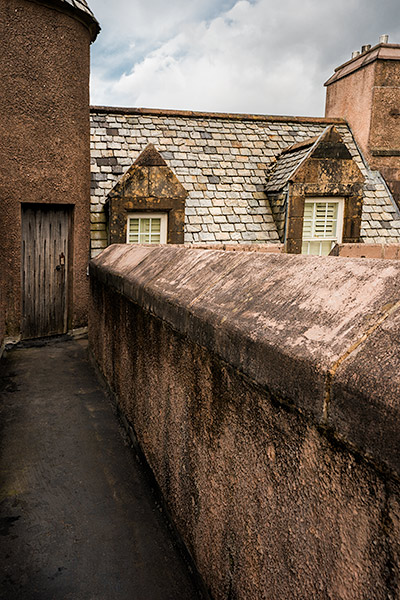 Walk on the rooftop battlements while staying in a castle