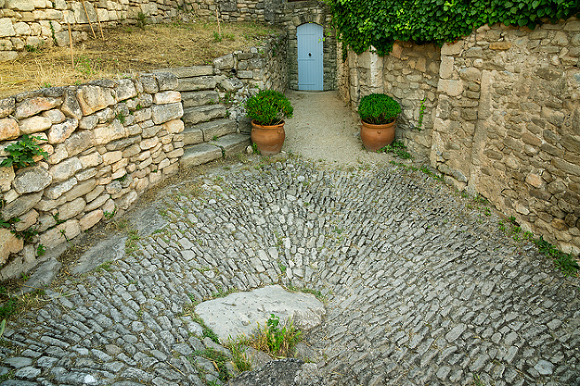 cobblestones up to the chateau in Lacoste village Provence, France