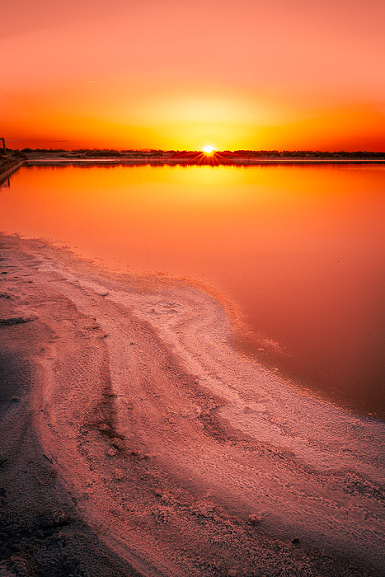 Staying on a pink salt pond in Salin d