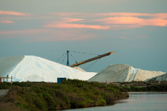 Salinas de Aigues Mortes, salt flats where salt is harvested in the Camargue, Aigues- Mortes, France, Europe